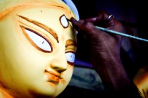 Third eye is being drawn on an idol of Goddess Durga